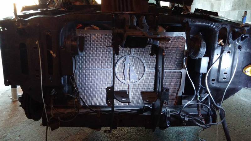 Custom parts guard the radiator, and also look cool.